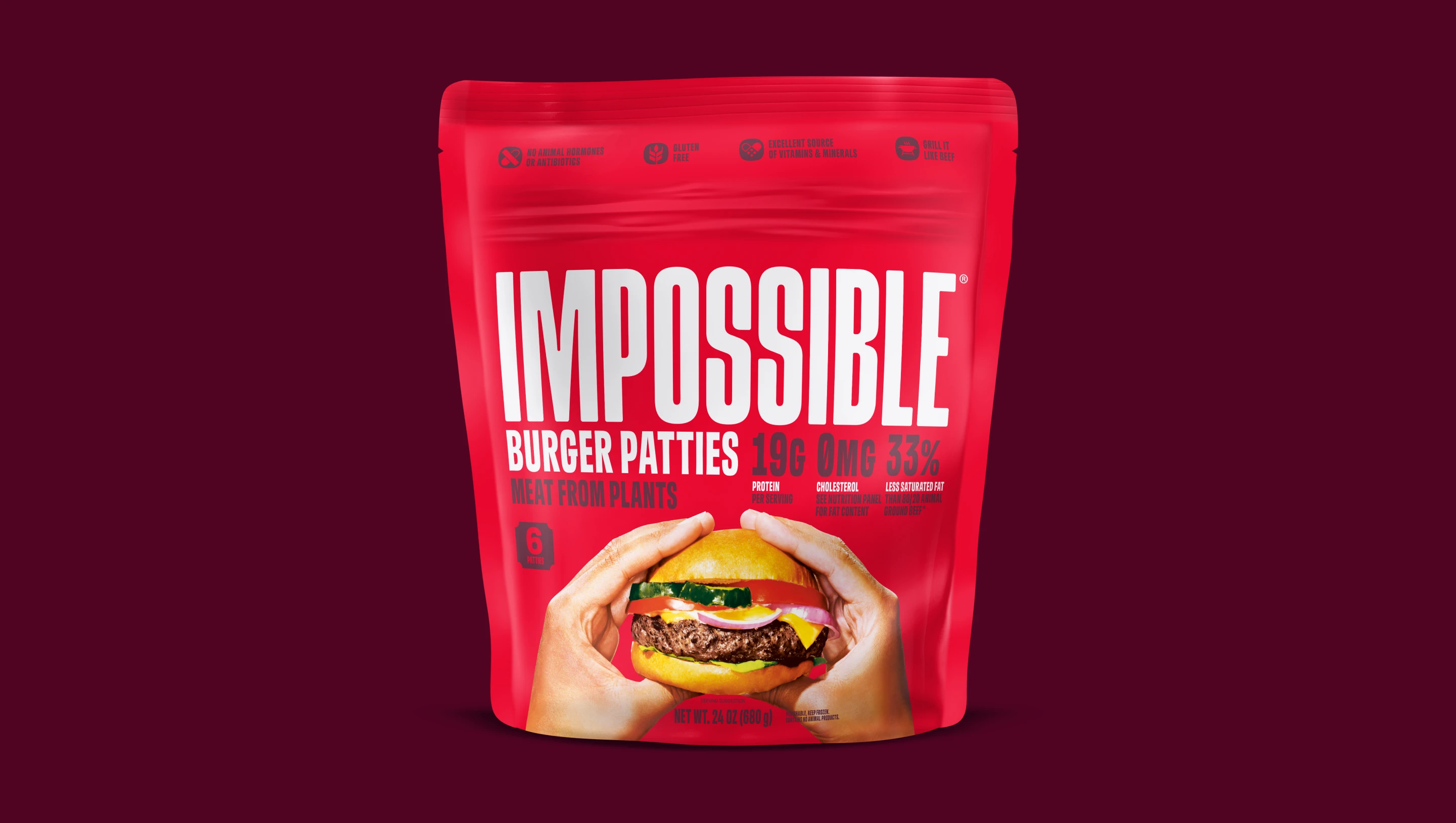 Front of pack of Impossible Beef Patties, 6ct, from plants on a dark background.