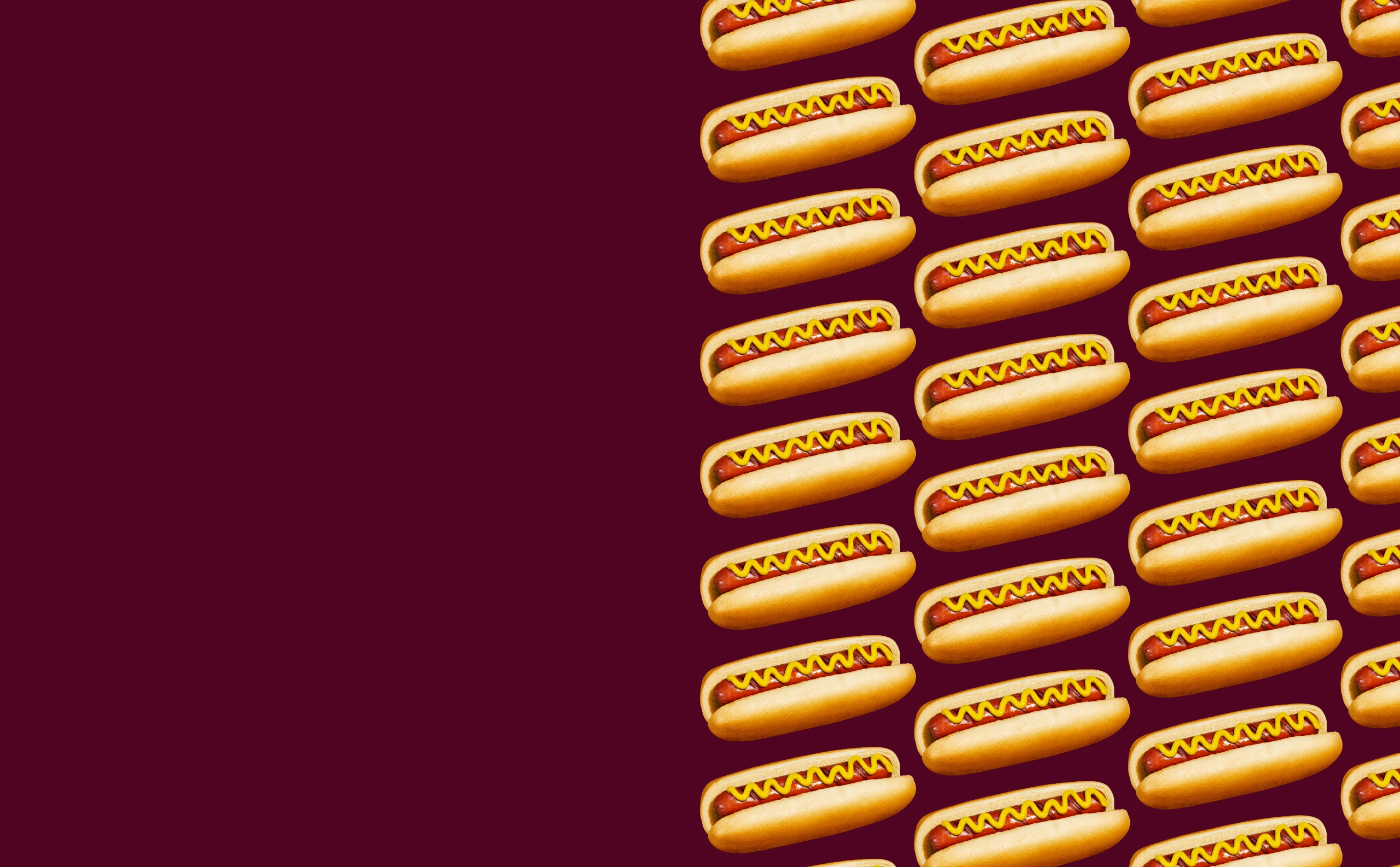 Impossible Foods Beef Hot Dogs Made from Plants in a grid pattern on a dark background