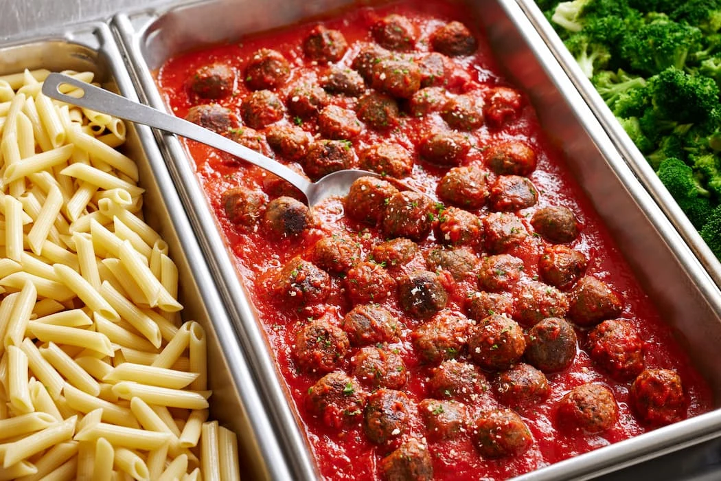 Impossible Meatballs on steam by broccoli and pasta