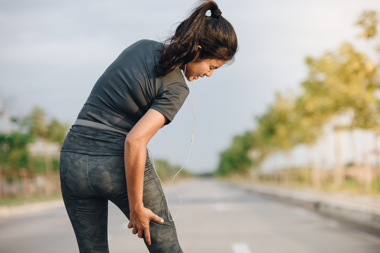 woman-touching-her-hamstring-in-pain