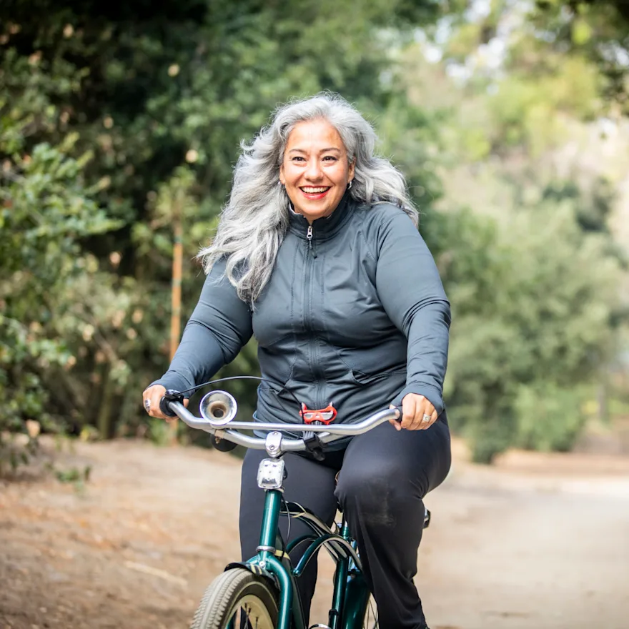 Woman biking.