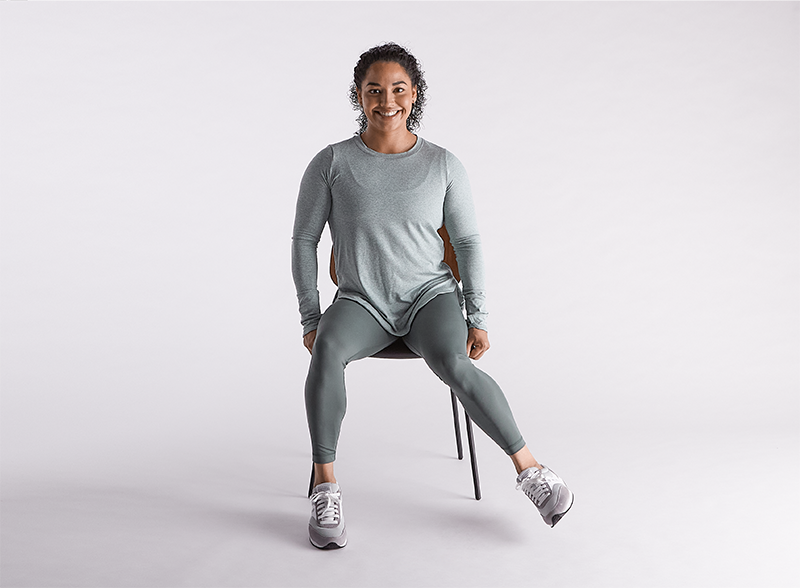 woman-sitting-on-chair-doing-internal-hip-rotation-exercises