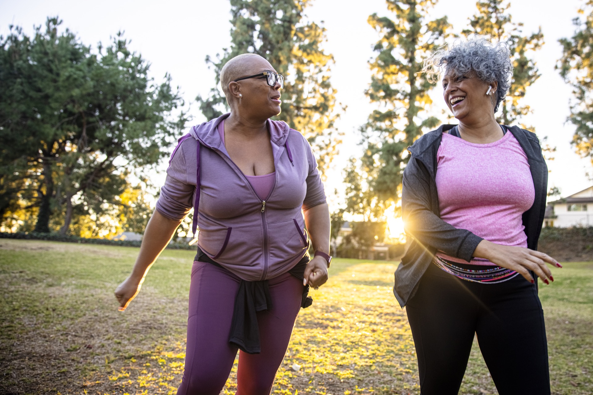 Two-black-women-walking-for-exercise-in-the-morning-is-walking-good-for-arthritis-in-the-knee