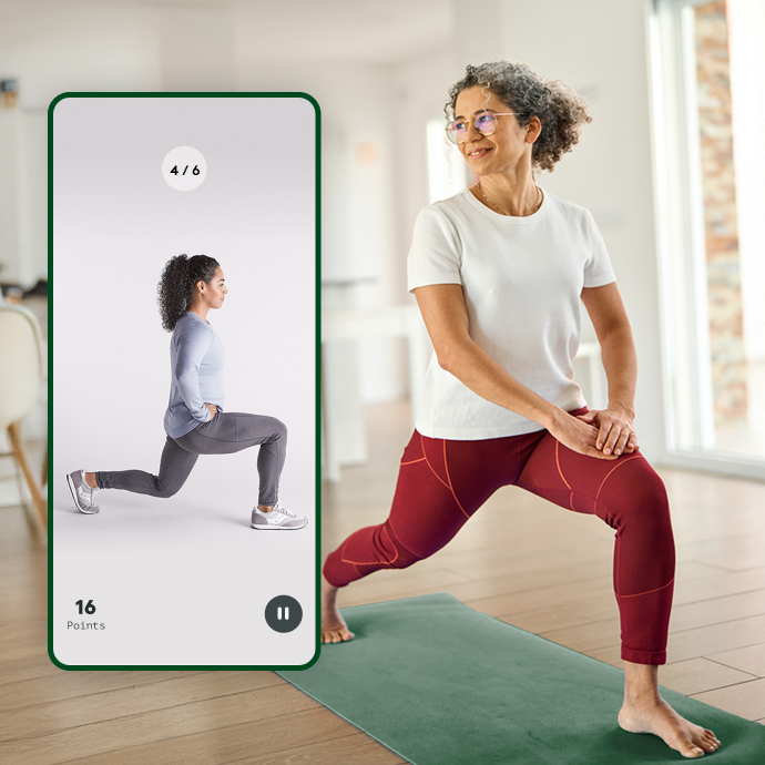 Woman doing a lunch, following along with Hinge Health app
