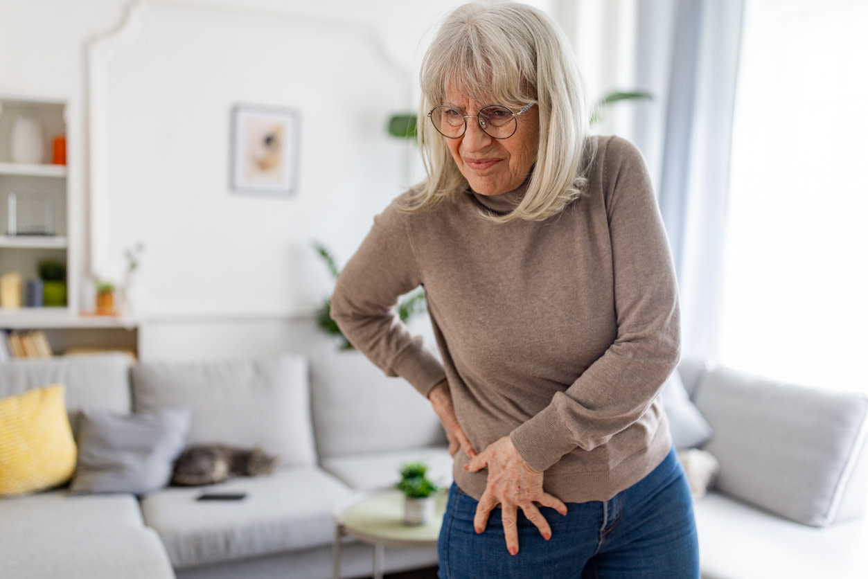 woman feeling hip bone spur