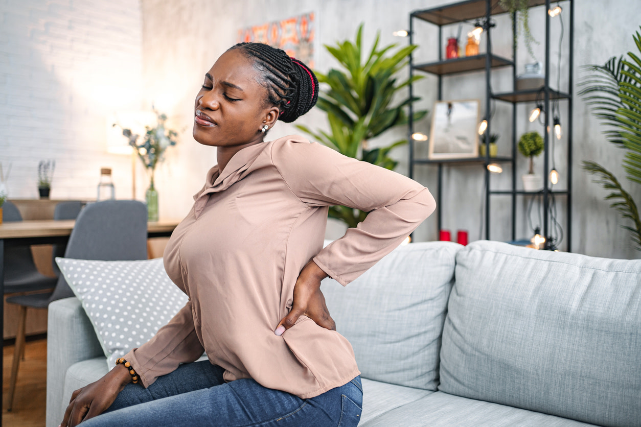 woman feeling musculoskeletal pain