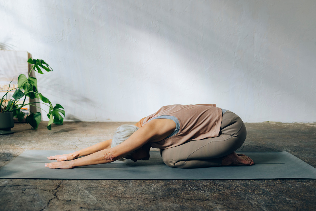 woman doing lat stretches