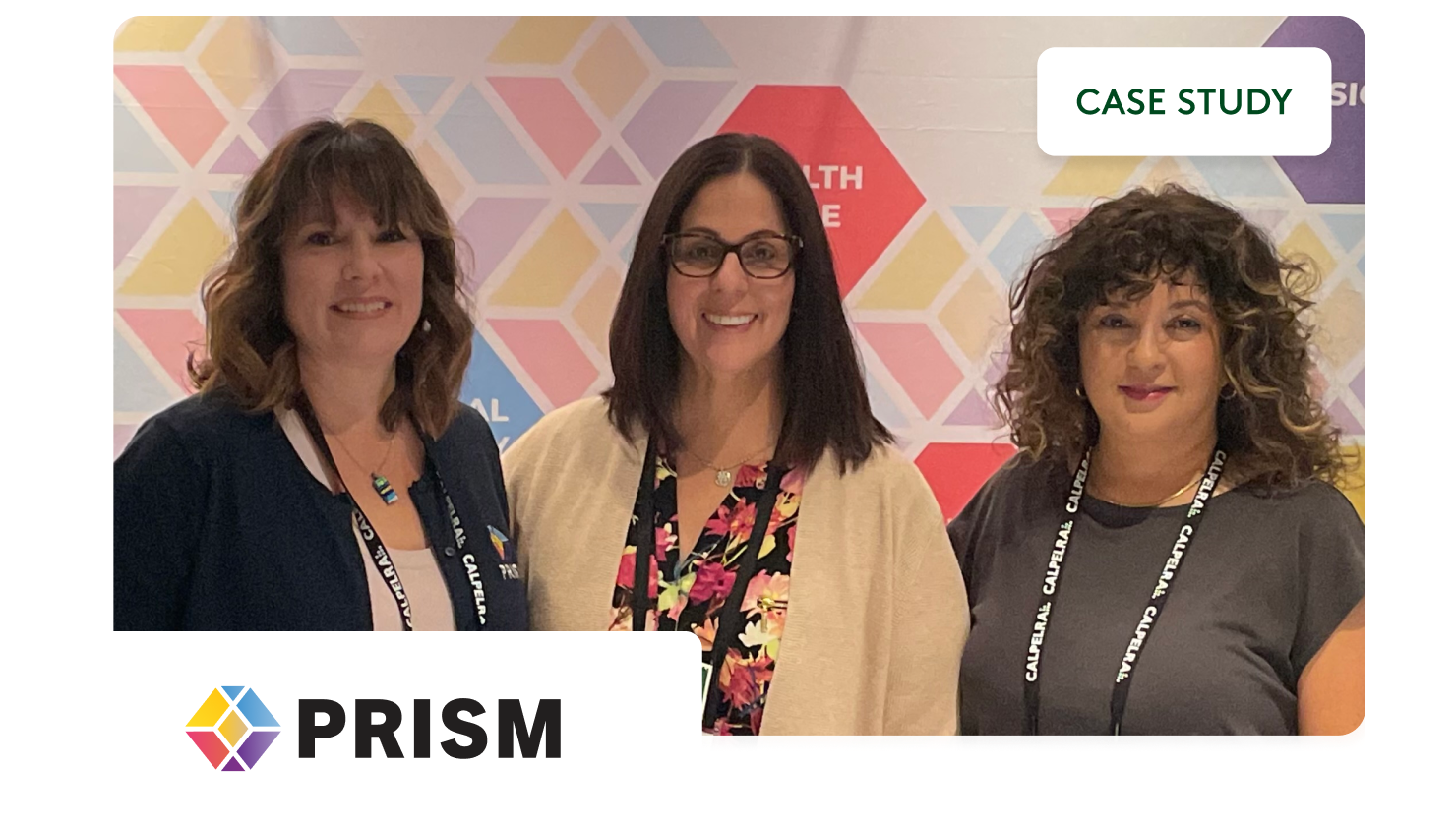 PRISM employee gathering together at an internal conference