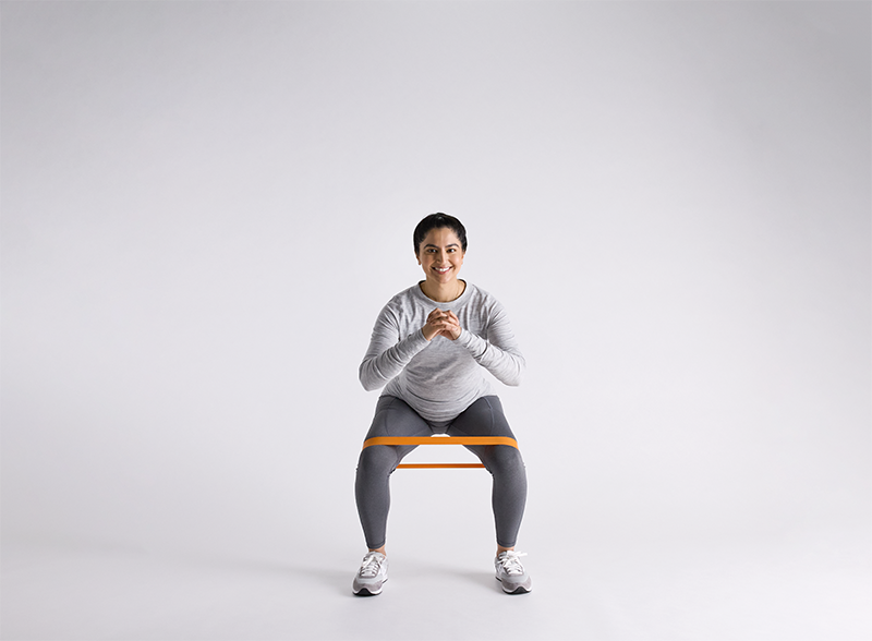 How to Do Banded Squats: A Hinge Health Guide
