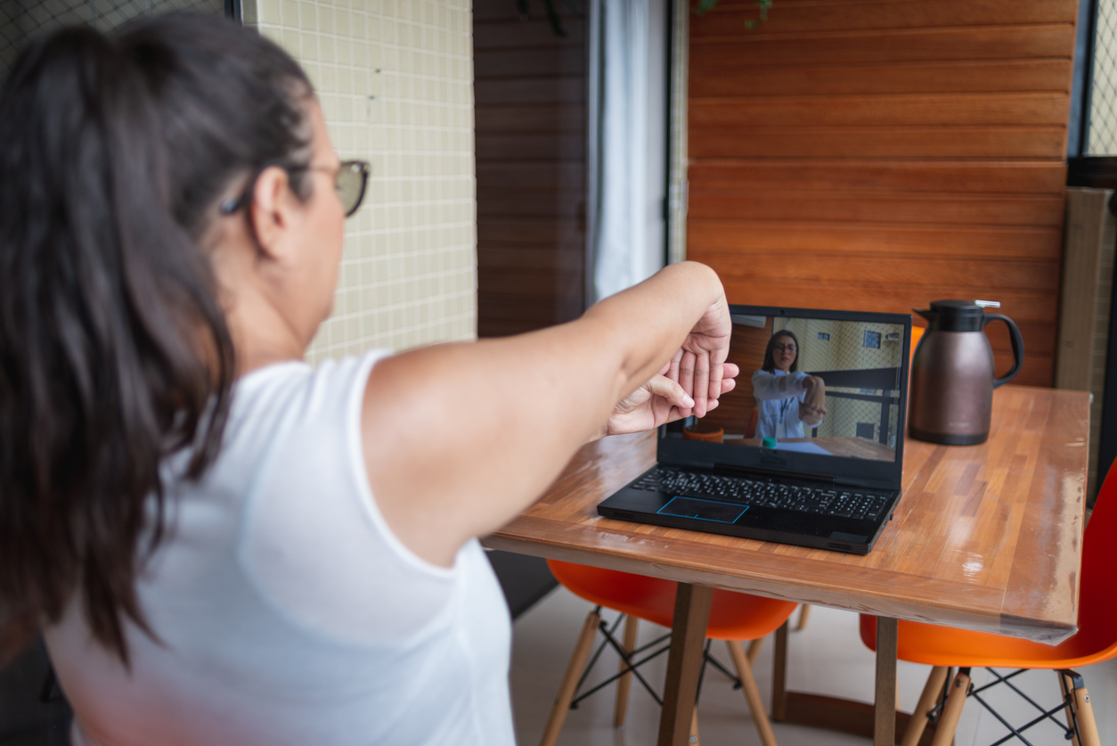 woman-practicing-wrist-stretches