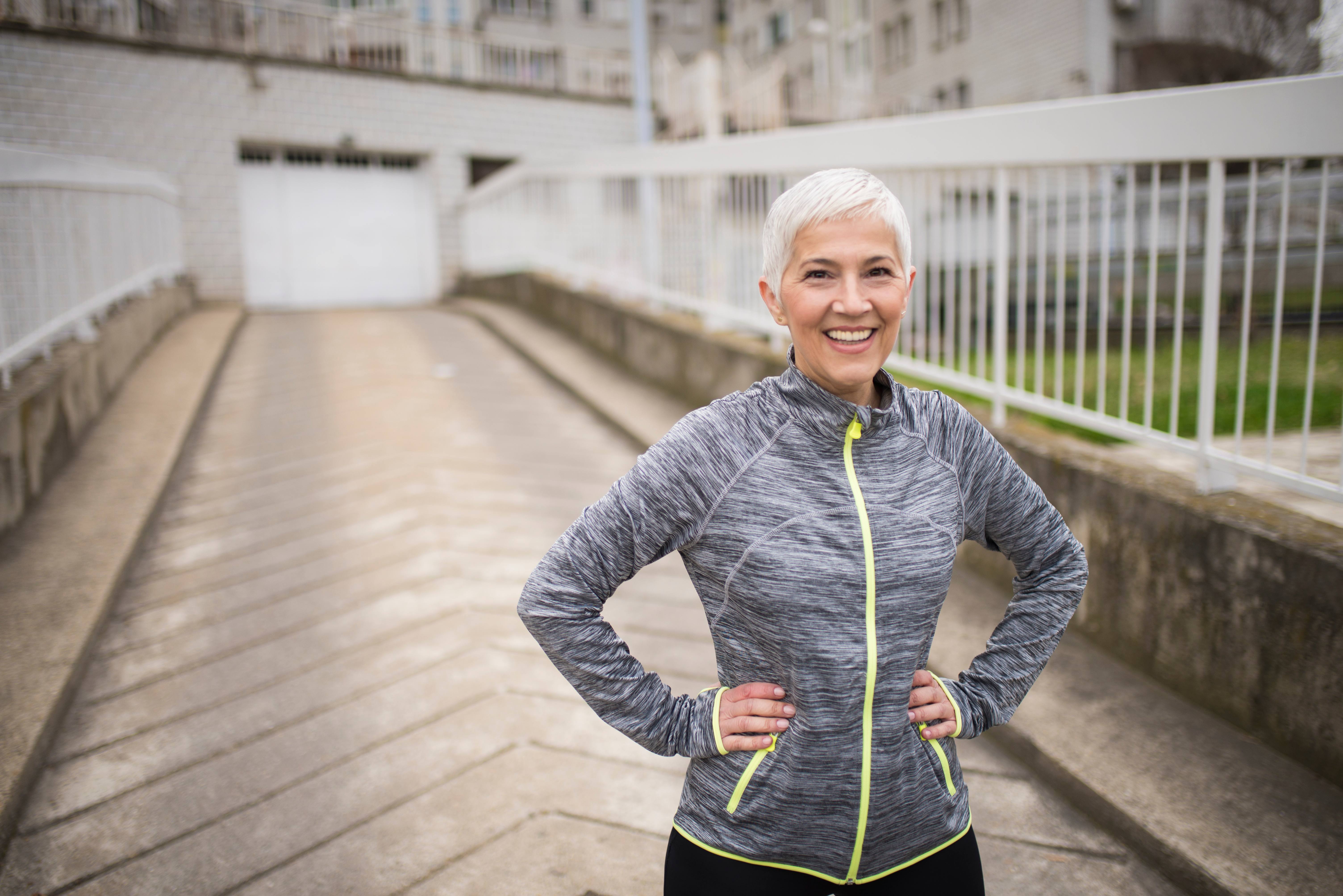 older-woman-smiling-after-outdoors-workout