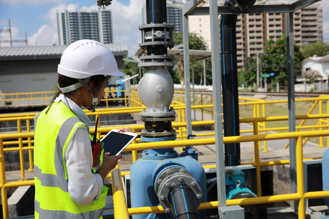 Female employee on water site visit 