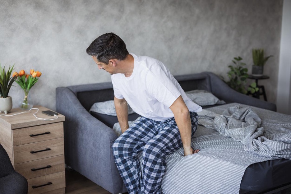 Log roll technique: getting in and out of bed with back pain