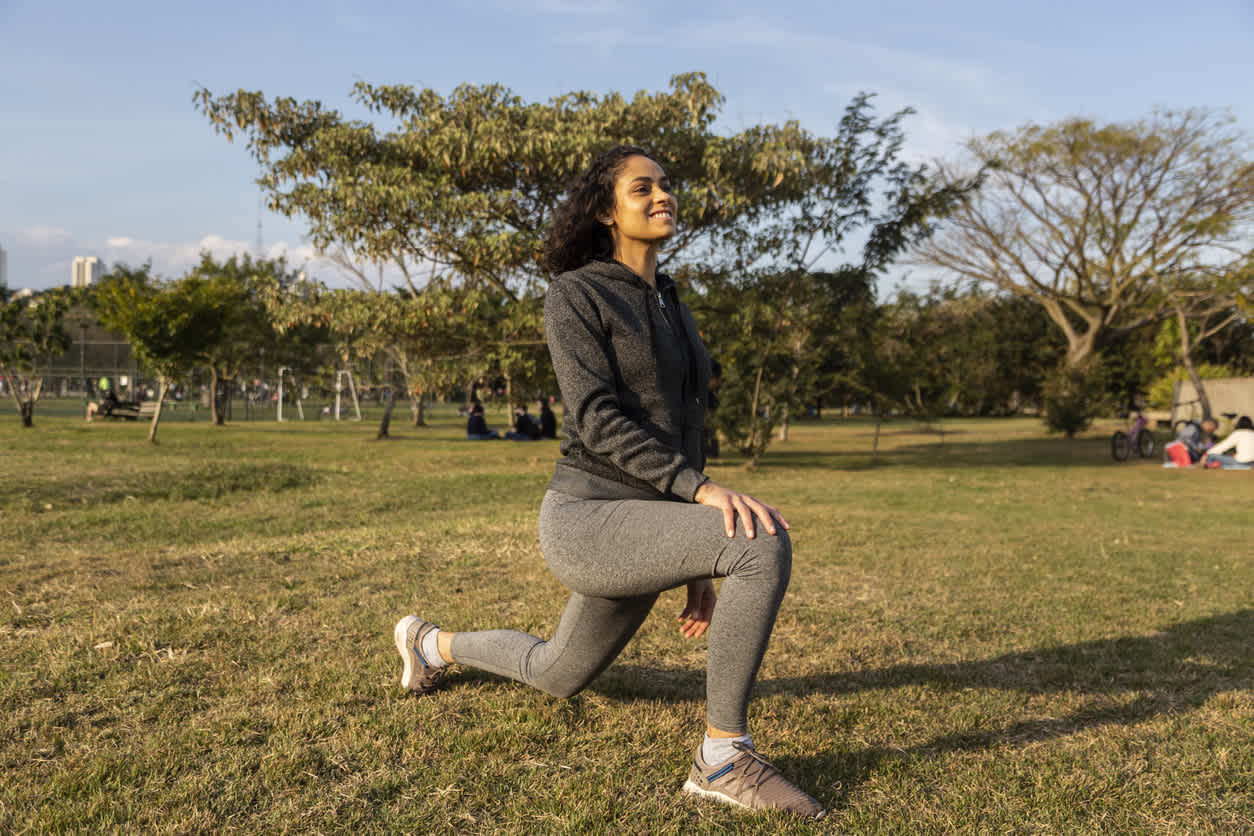 Woman-stretching-her-leg-after-outdoors-run