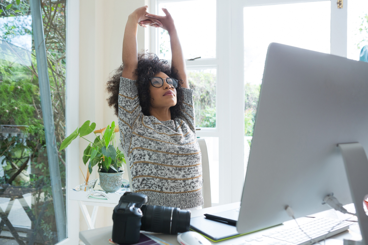 women-stretching-while-sitting