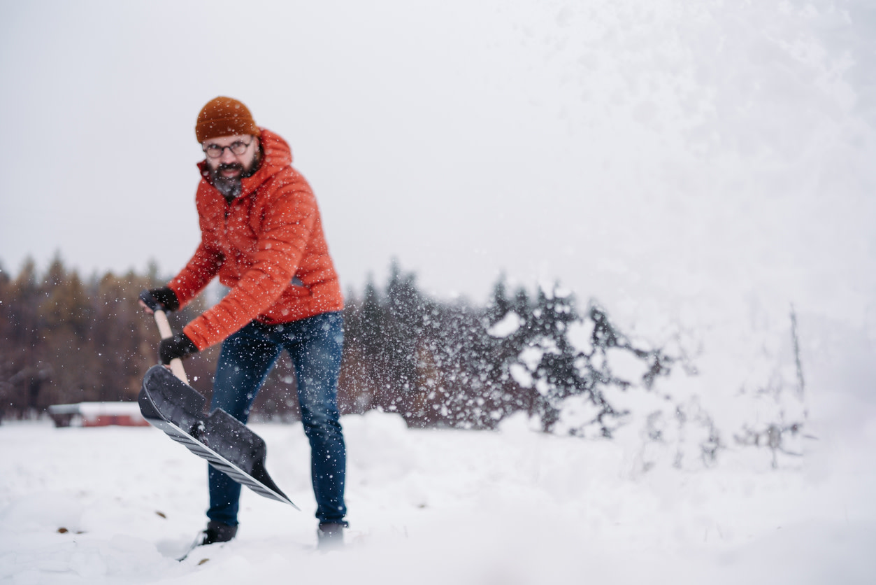 Man shoveling snow.