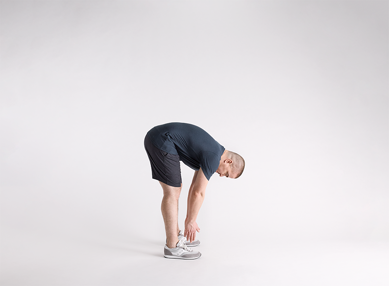 How to Do a Standing Forward Bend: A Hinge Health Guide