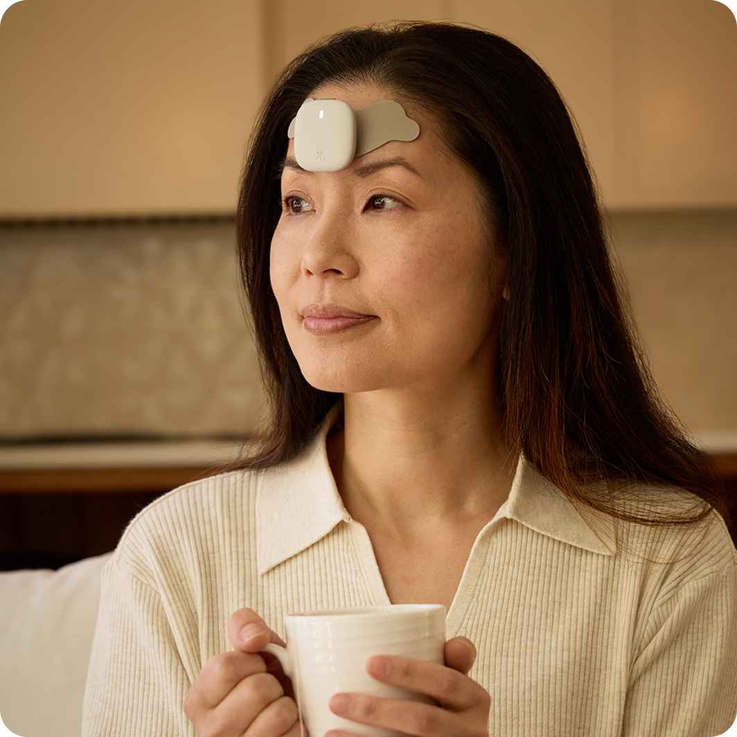 A woman wears an Enso for Migraine on her forehead. A closeup of the Hinge Health app shows the migraine relief interface with playback controls.