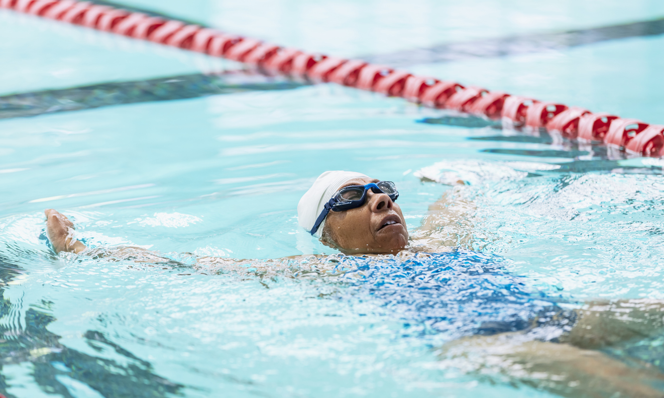woman thinking if is swimming good for back pain