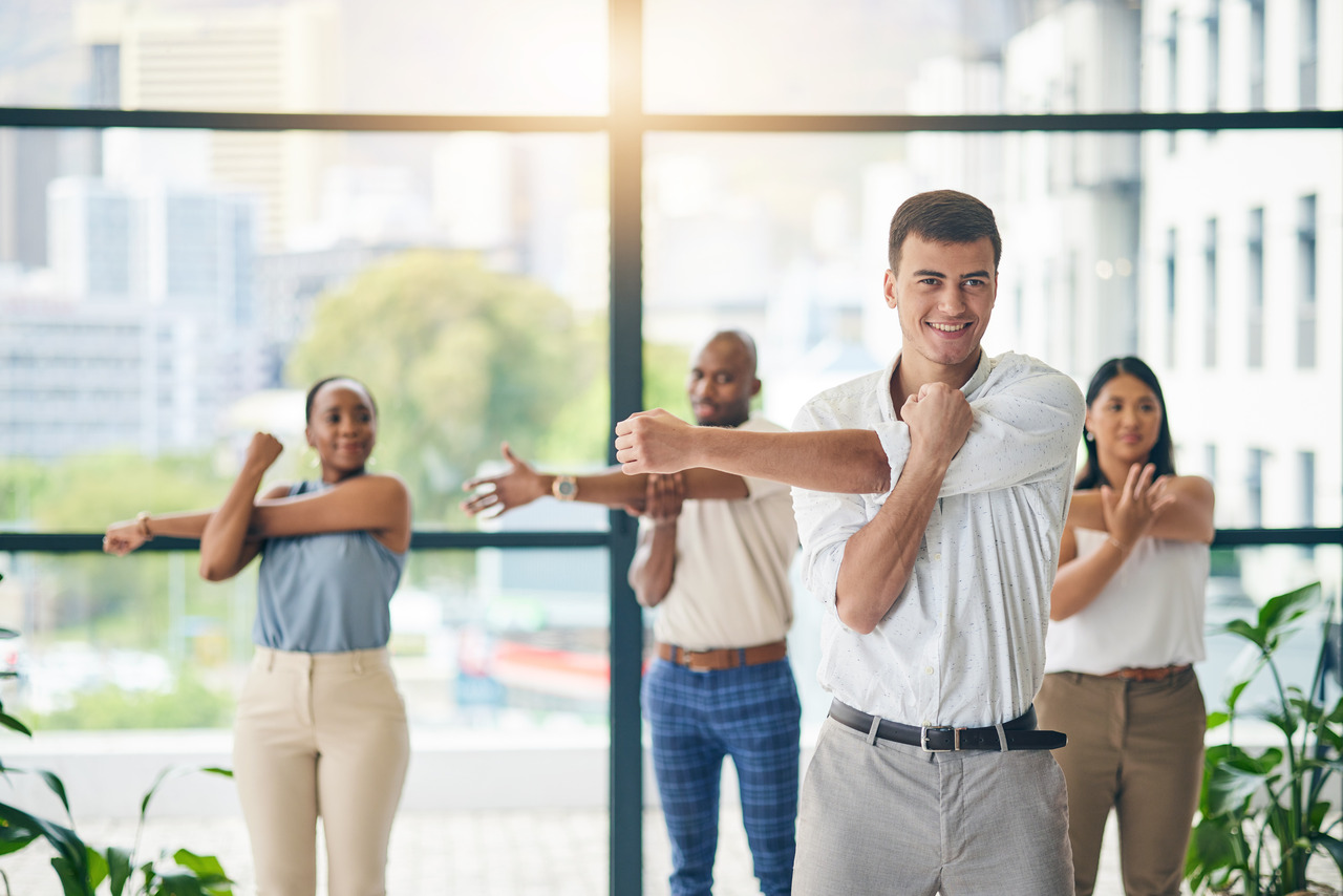 Employees-stretching-in-the-office