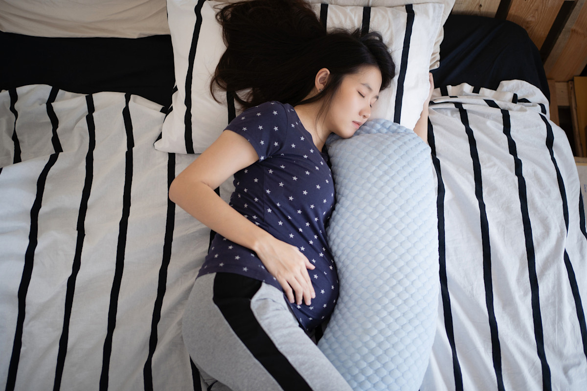 Pregnancy Sleep Positions: Tips for More Comfort, Less Pain, and Better Sleep