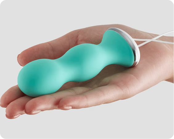 A hand is holding the Hinge Health Pelvic Trainer by Perifit, a small teal biofeedback device to strengthen the pelvic floor.