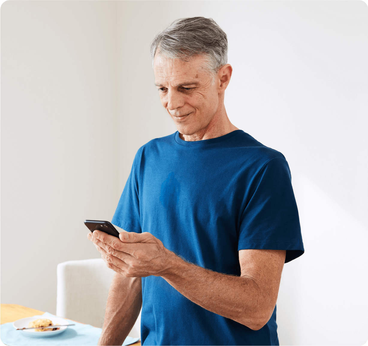 man looking at his phone