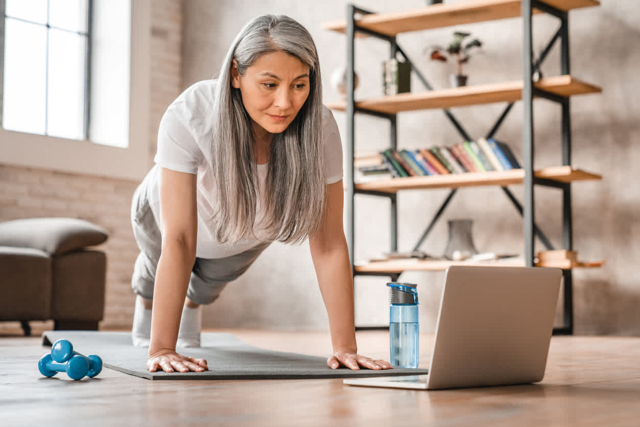 woman-doing-planks-at-home-work-out