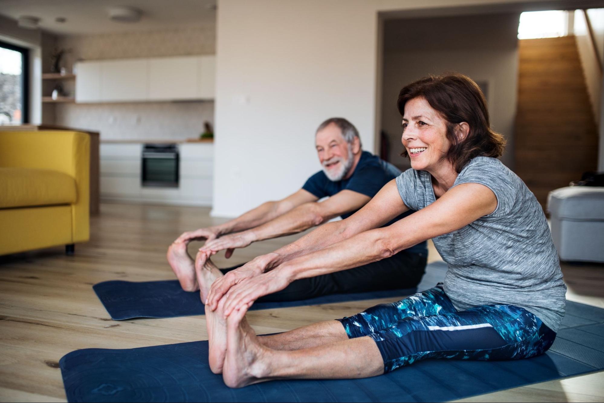 senior-couple-stretching-to-relieve-foot-arthritis