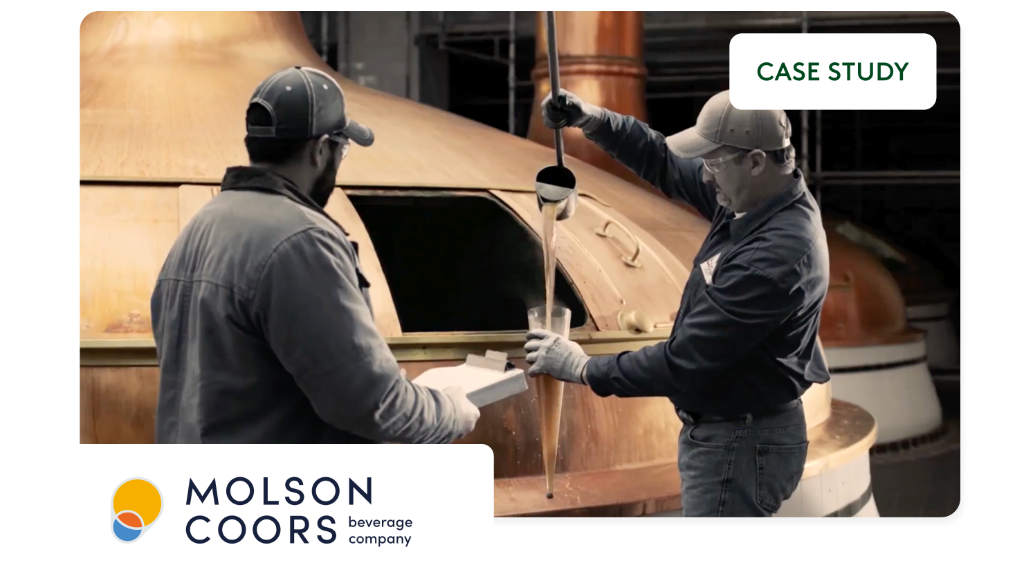 Employees in the factory making beer