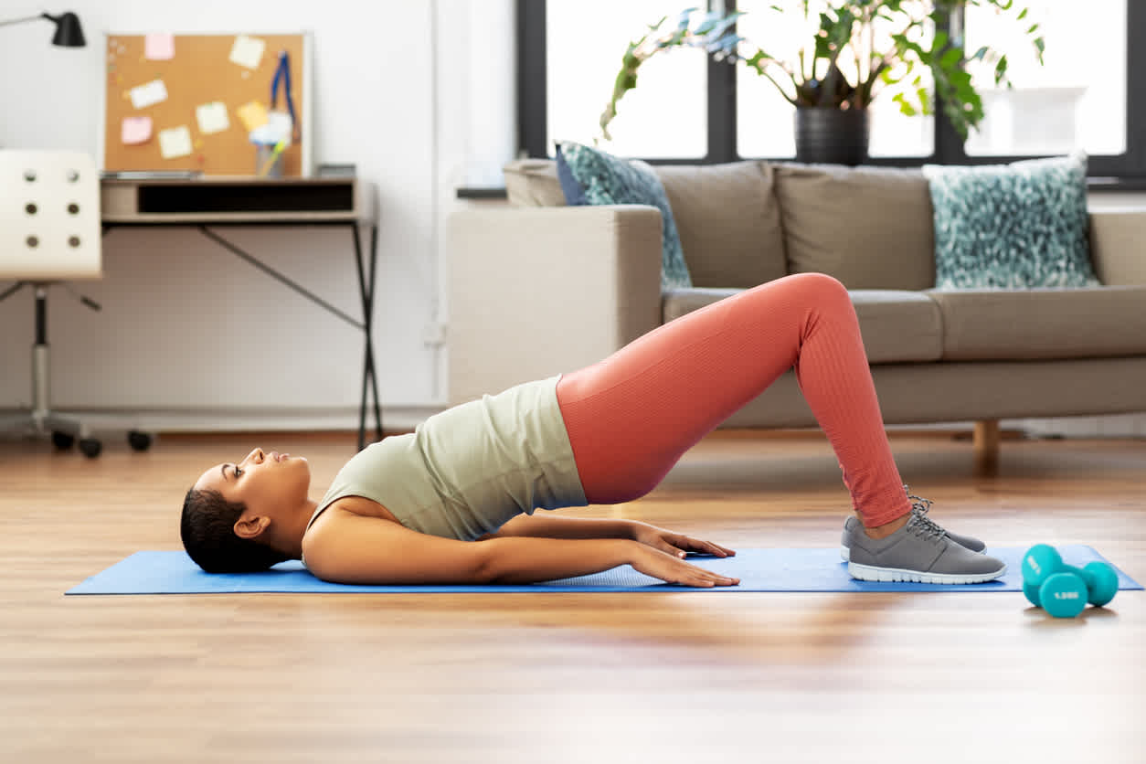 woman-stretching-in-yoga-floor