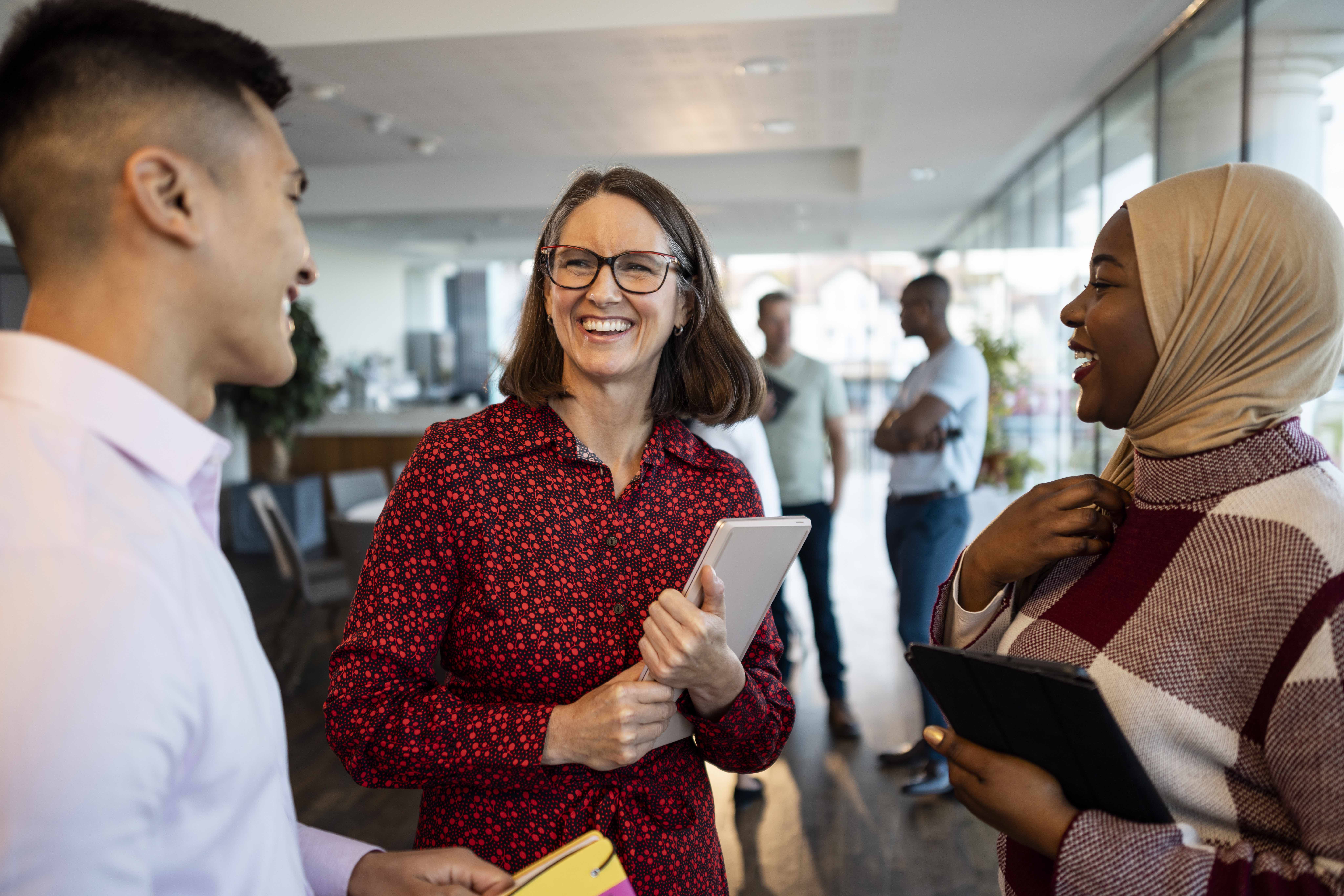 Manager talking with coworkers