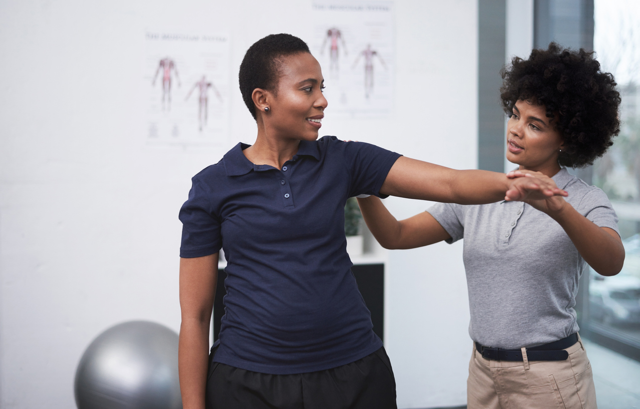 Man exercising during remote physical therapy session
