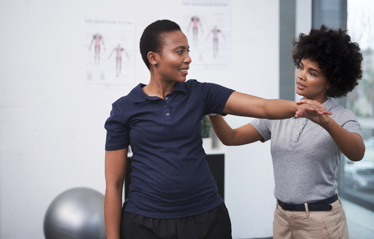 Man exercising during remote physical therapy session