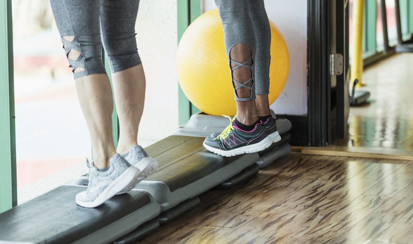 Two women doing calf strengthening exercises