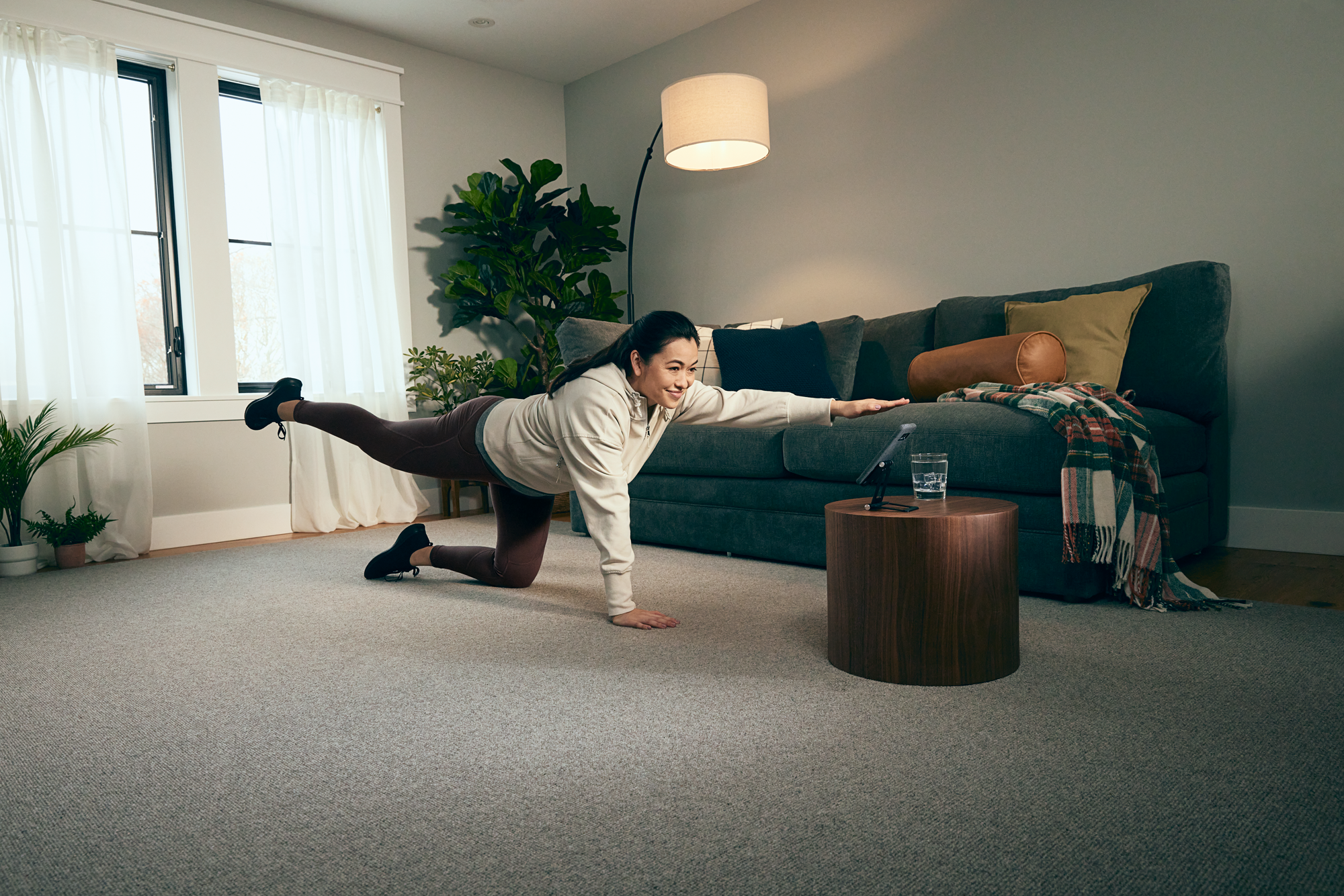 Woman doing exercise at home