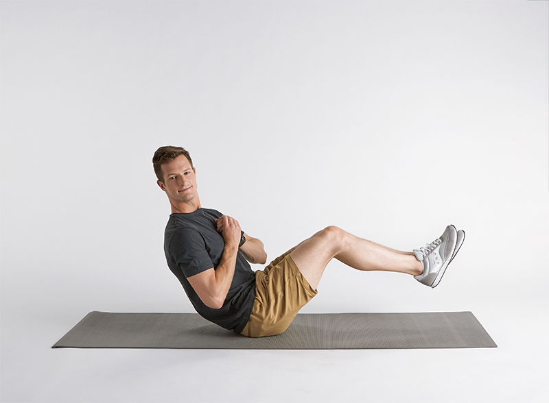 man-practicing-oblique-twist