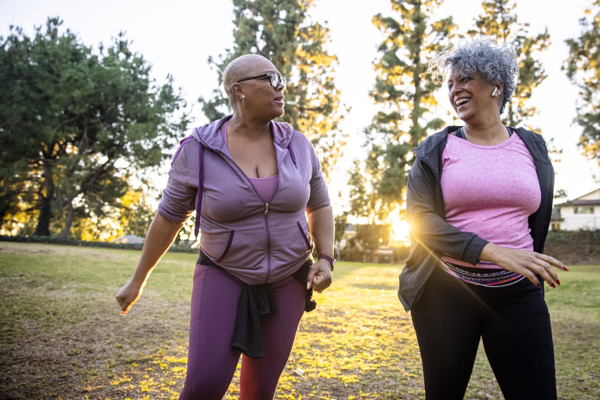 Two-black-women-walking-for-exercise-in-the-morning-is-walking-good-for-arthritis-in-the-knee