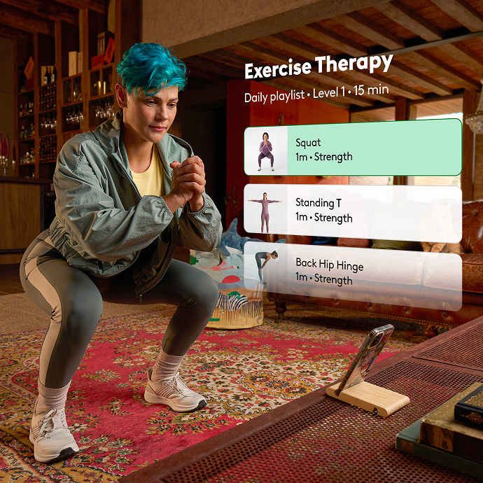 Lady doing exercises with the Hinge Health app showing a chair pose followed by a male doing a leg lift exercise in a chair