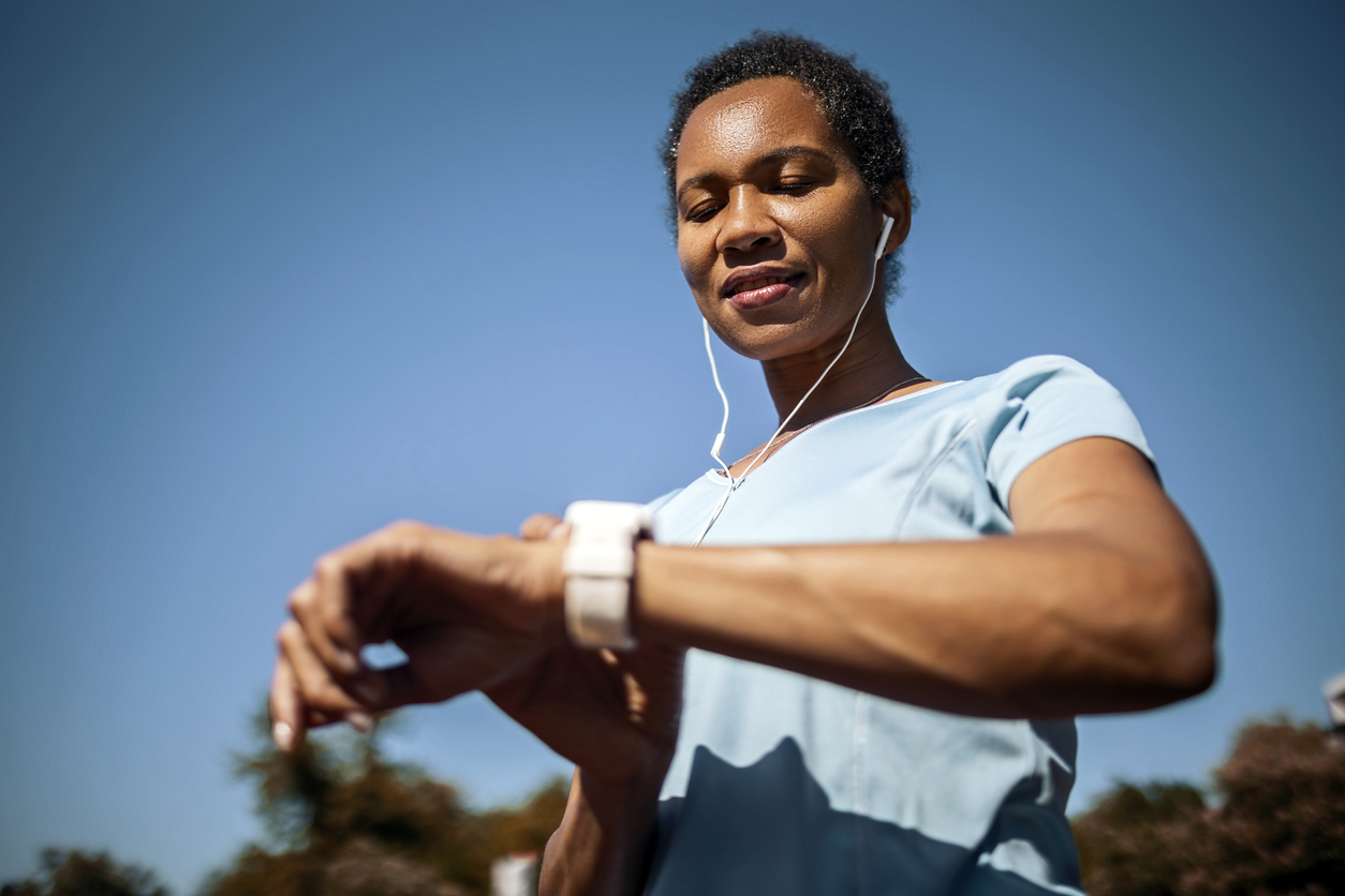 woman thinking how many steps should i take in a day