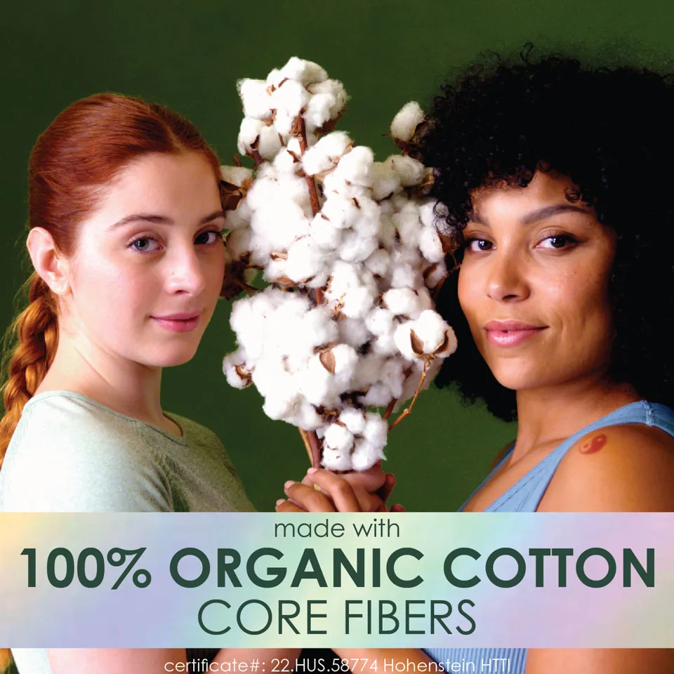 Two women smiling holding fluffy cotton. L. tampons are made with 100% organic cotton core.