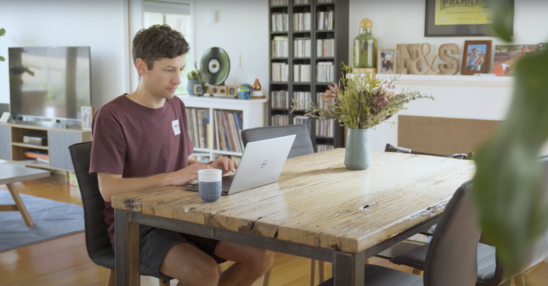 Shea sitting at the table using the Hello Sunday Morning self assessment tool