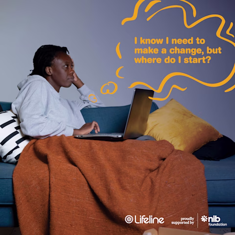 Image of a woman sitting on a couch, using her laptop. Image of a woman sitting on a couch, using her laptop.
