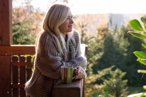 A woman at home on her balcony