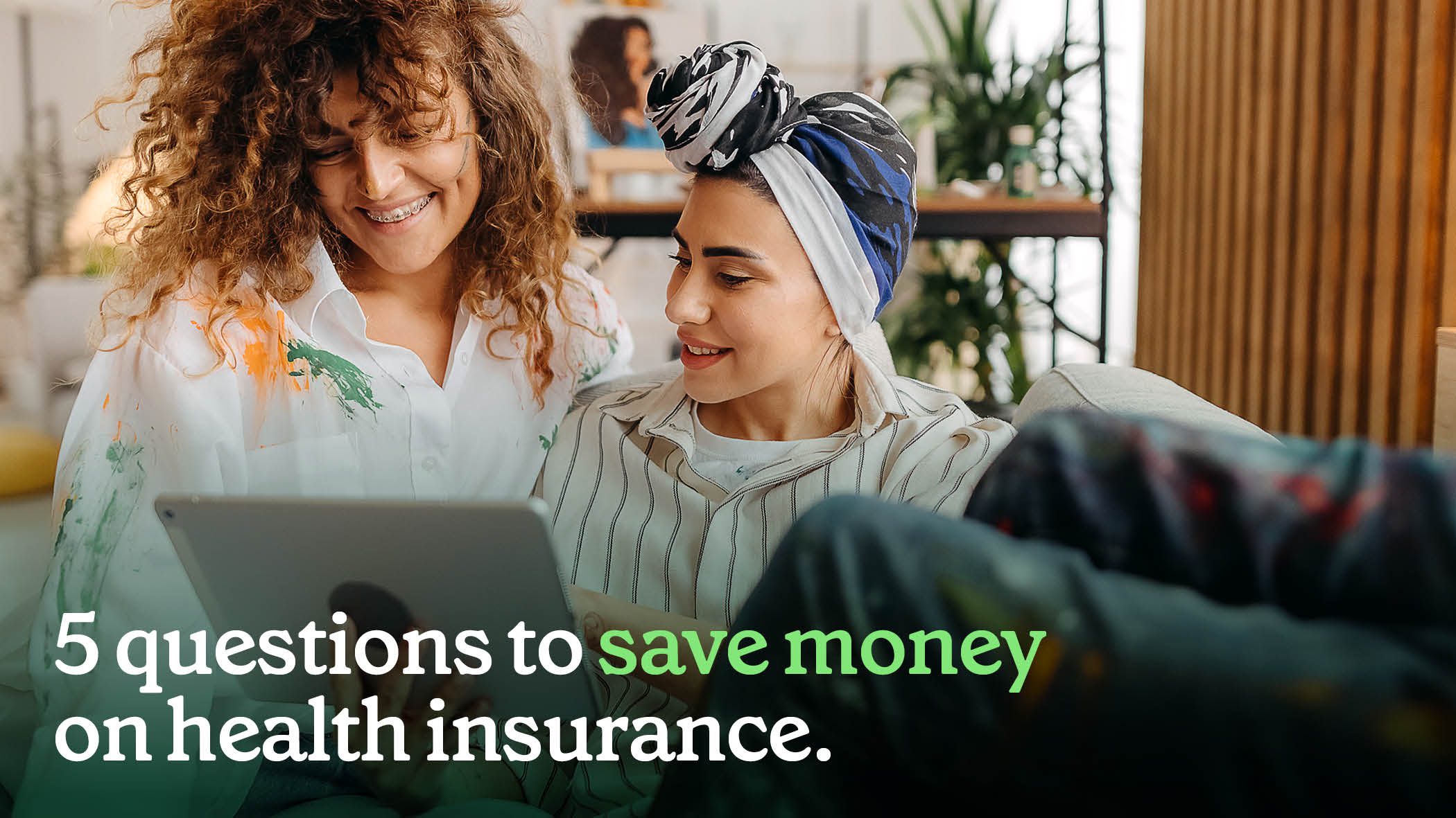 Two people looking at a laptop. Text reads: 5 health insurance questions that could save you money