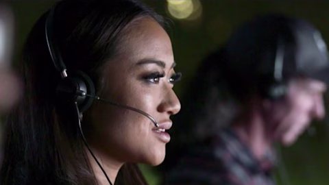 Image of female support worker in a call centre wearing a headset Image of female support worker in a call centre wearing a headset