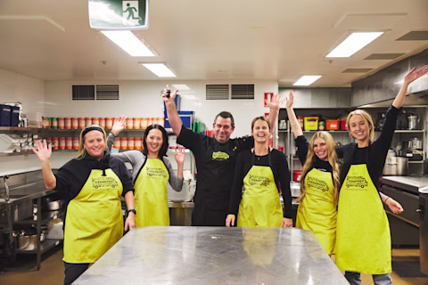 nib staff members helping at an OzHarvest kitchen. nib staff members helping at an OzHarvest kitchen.