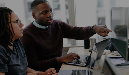 Two people working together