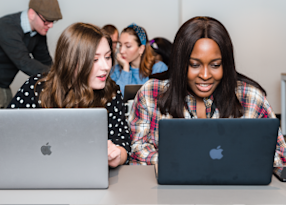 2 students learning at Flatiron School