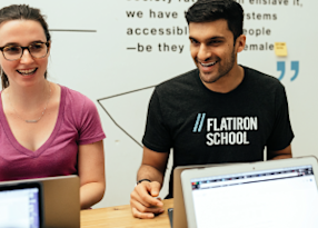 Flatiron School students learning